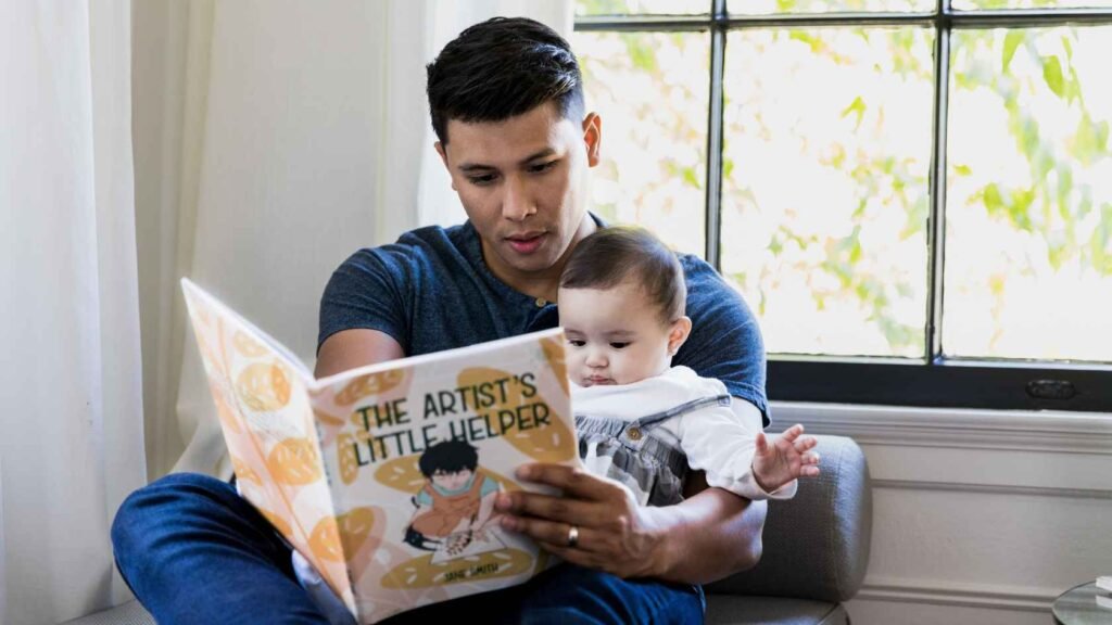 Dad Read a Book to His Baby