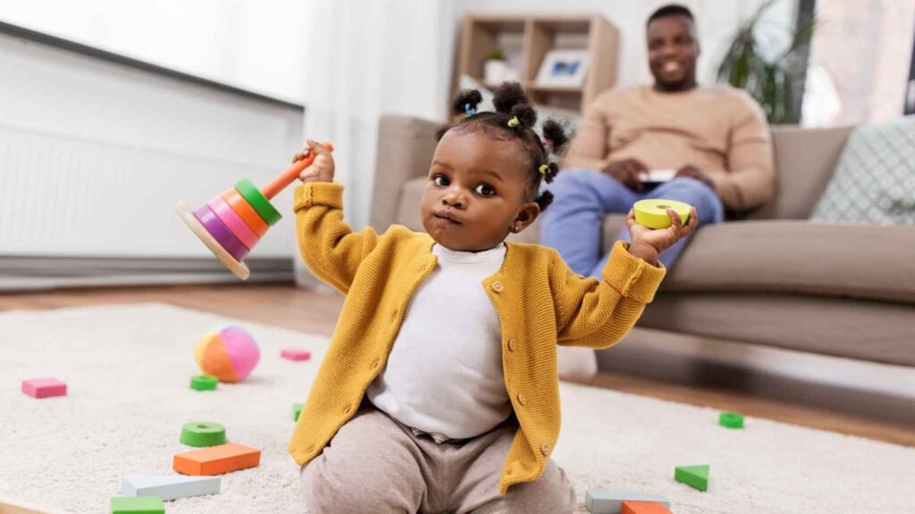 Dad Watching His Daughter Independent Play