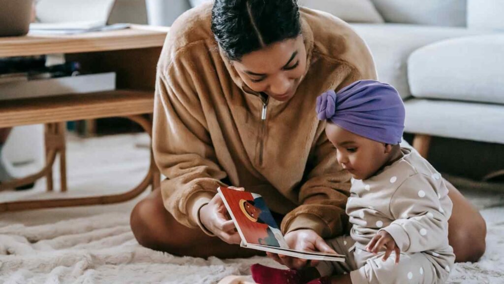 Mom Read Book with Her Baby