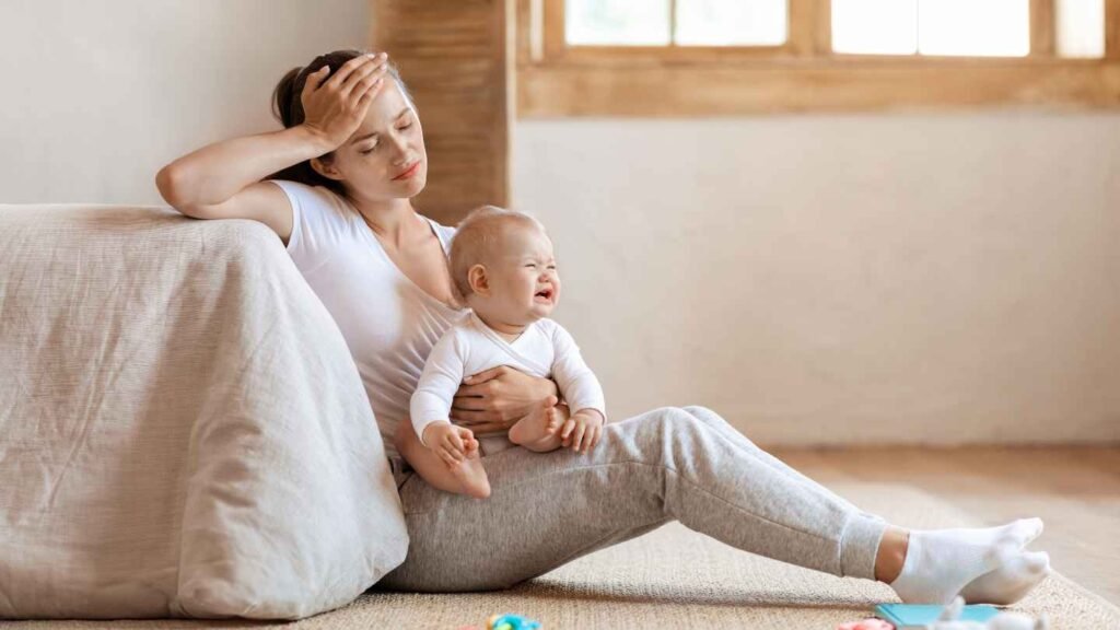 Mom and Baby Sitting Tired and Stress