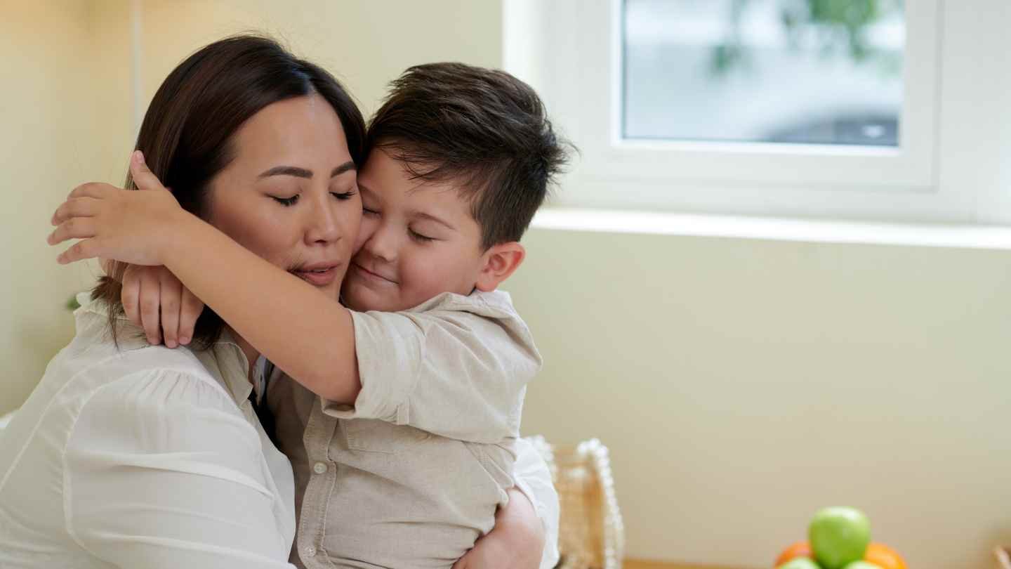 Mom Hug Her Boy - does daycare affect attachment