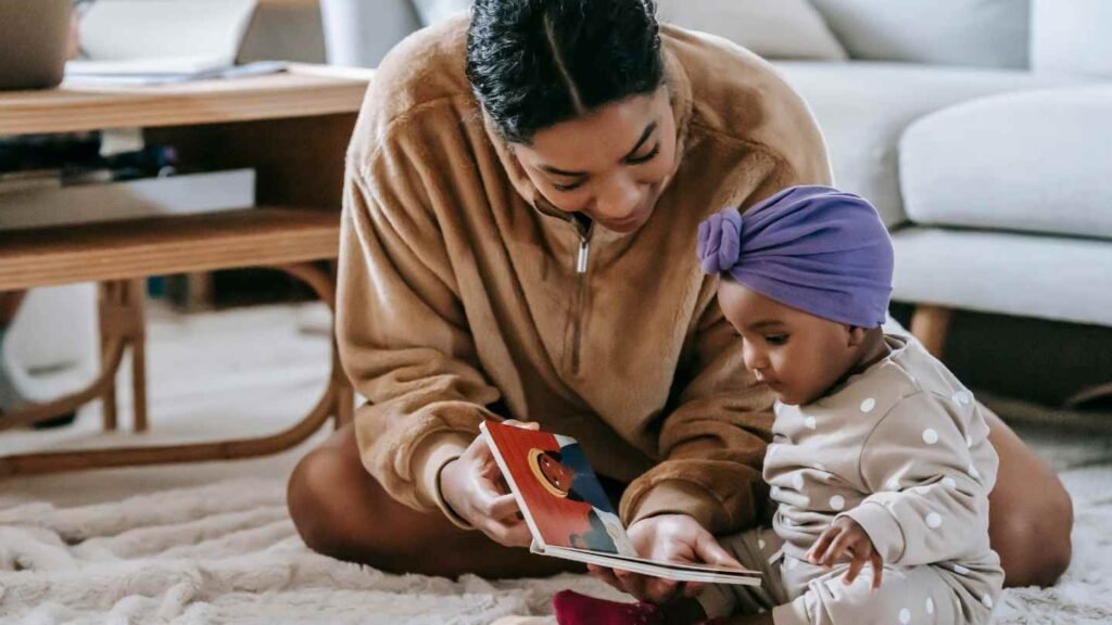 Mom Spending Time With Daughter by Reading Book